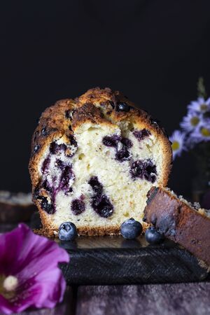 Homemade fresh blueberry butter cake with lime and nutsの写真素材