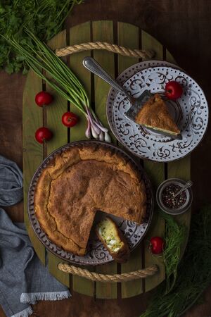 fresh homemade pie with green onions and eggsの写真素材