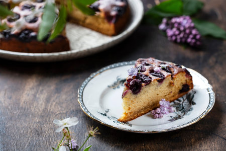 homemade cake with cherries, ricotta and powdered sugar