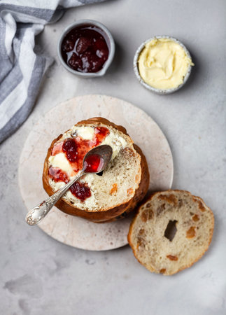 fresh bagel with raisins and cinnamon for breakfastの写真素材
