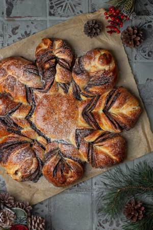 christmas homemade bread zvezda with chocolate-nut paste and powdered sugar