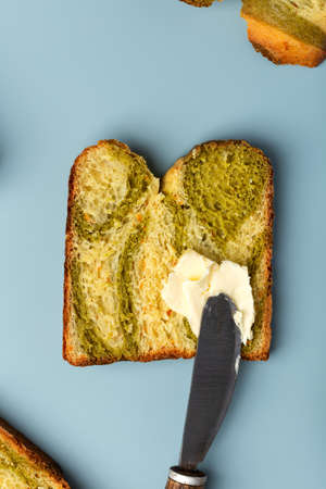 slice of matcha tea marble loaf breadの写真素材