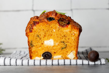 Savoury cake with tomatoes, olives and feta cheeseの写真素材