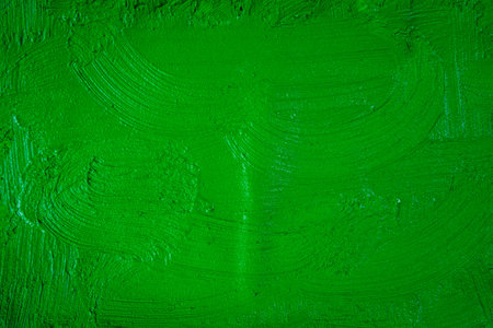A beautiful Green paint texture on wall, background - Image. Color paint strokes.の写真素材