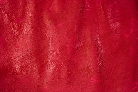 A beautiful Crimson paint texture on wall, backgroundの写真素材