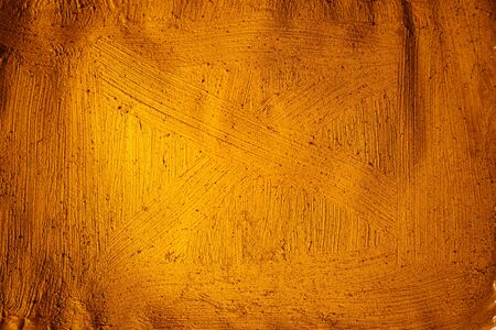 A beautiful Gold paint texture on wall, background -の写真素材