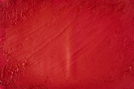 A beautiful Crimson paint texture on wall, background - Image. Color paint strokes.