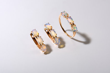 Elegant jewelry set. Jewelery set with gemstones. jewelry accessories collage. product still life concept. Ring, necklace and earrings.の写真素材