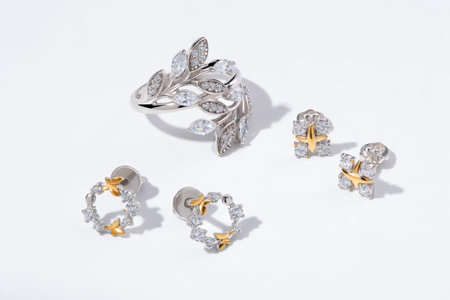 Elegant jewelry set. Jewelery set with gemstones. jewelry accessories collage. product still life concept. Ring, necklace and earrings.の写真素材