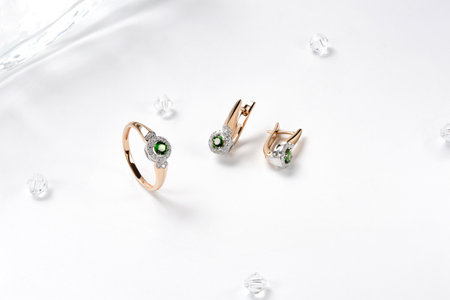 Elegant jewelry set. Jewelery set with gemstones. jewelry accessories collage. product still life concept. Ring, necklace and earrings.の写真素材