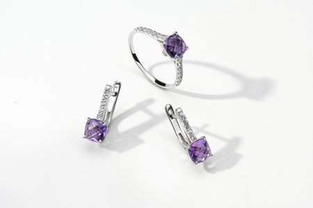 Elegant jewelry set. Jewelery set with gemstones. jewelry accessories collage. product still life concept. Ring, necklace and earrings.の写真素材