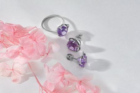 Elegant jewelry set. Jewelery set with gemstones. jewelry accessories collage. product still life concept. Ring, necklace and earrings.の写真素材