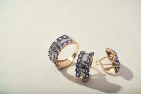 Elegant jewelry set. Jewelery set with gemstones. jewelry accessories collage. product still life concept. Ring, necklace and earrings.の写真素材