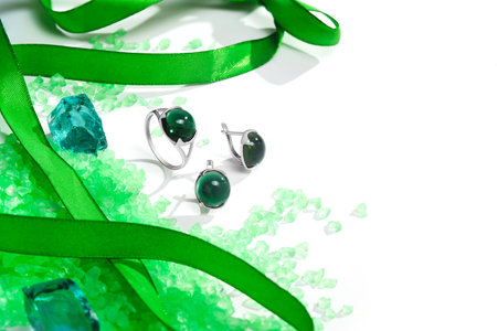 Elegant jewelry set. Jewelery set with gemstones. jewelry accessories collage. product still life concept. Ring, necklace and earrings.の写真素材