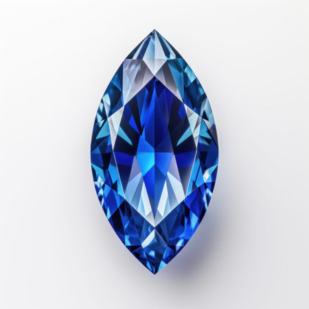 A detailed closeup shot of a stunning blue sapphire diamond resting elegantly on a pristine white surfaceの写真素材