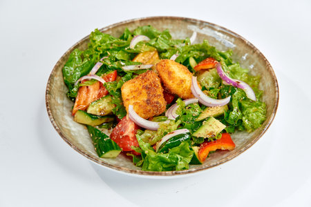 Colorful and Fresh Salad Featuring Crisp Lettuce, Assorted Vegetables, and Golden-Brown Fried Protein, Perfectly Balanced for a Healthy Meal Optionの写真素材