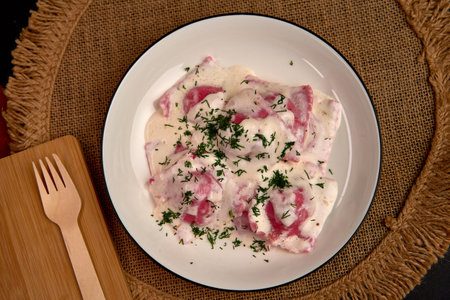 Delicious Traditional Dish Featuring Soft, Creamy Texture with Fresh Herbs and Colorful Presentation for a Taste of Authentic Culinary Delightの写真素材