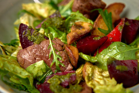 A Colorful and Nutritious Salad Featuring Fresh Ingredients Including Tender Meat, Crunchy Vegetables, and Flavorful Herbs for a Healthy Meal Optionの写真素材