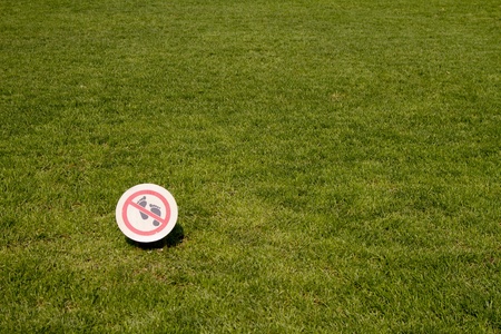 A perfect grass and a forbidden signalの写真素材