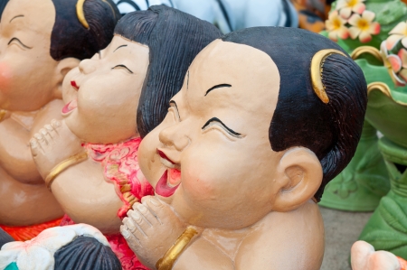 Dolls in traditional stucco.の写真素材