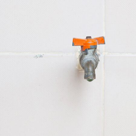 Old tap water の写真素材