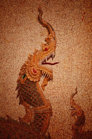 Background dragon statue is a symbol of Buddhismの写真素材