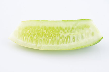 Fresh slice cucumber on white backgroundの写真素材