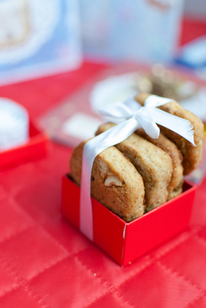 Homemade cookies crackers with slices of nuts and chocolateの写真素材