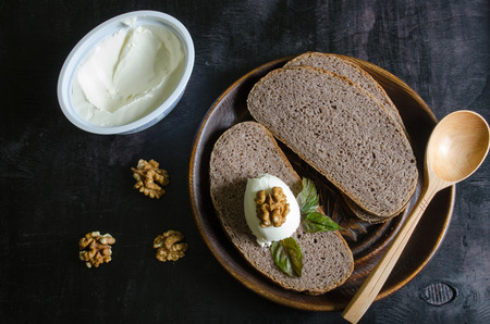 Bread sourdough with pesto walnut with cream cheeseの写真素材