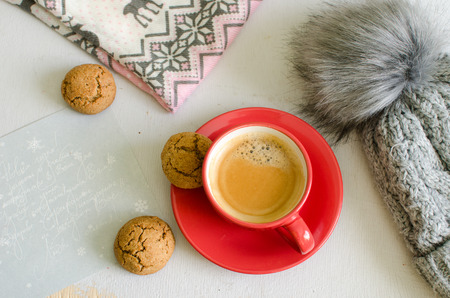 Coffee and cookies in the winter after a walkの写真素材