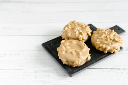 Chocolate Ganache and Peanut Butter Peanut Sandwich Cookies with Chocolate Peanut Glaze