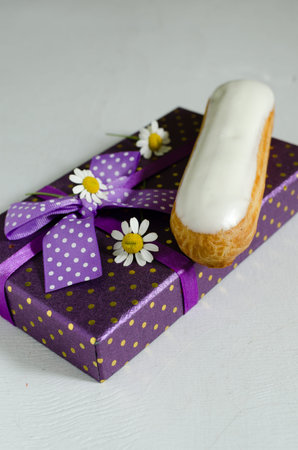 Homemade eclair with cream of cream cheese and blueberry coolieの写真素材