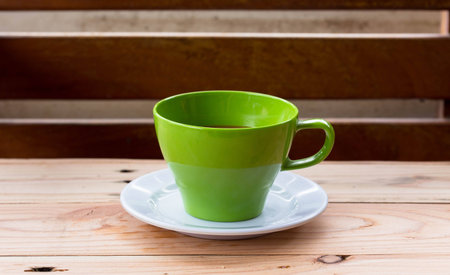 Cup of Coffee isolated on the table.