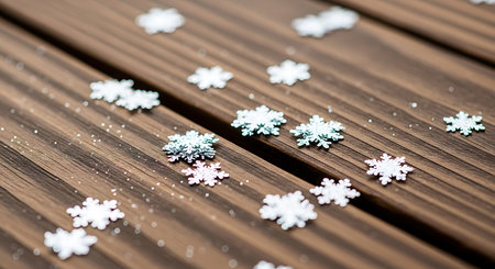 Snowflakes on a wooden surface. Christmas and New Year backgroundの素材
