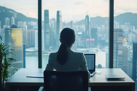 "Smiling Middle-Aged Woman in Headset Working Remotely | Friendly Customer Support Representative"の素材