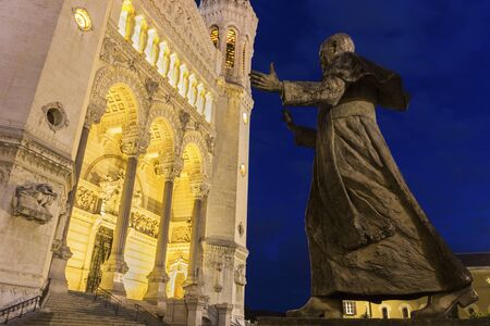 Basilica of Notre-Dame and Pope John Paul II statue in Lyon, Franceの写真素材