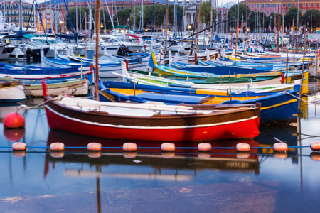 Boats anchored in the Port of Nice in France in the morningの写真素材