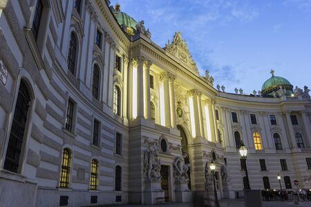 St. Michael's Wing Of Hofburg Imperial Palace in Vienna in Austria during an eveningのeditorial素材