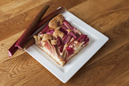 Cake with fresh rhubarbの写真素材