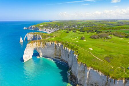 Picturesque panoramic landscape on the cliffs of Etretat. Natural amazing cliffs. Etretat, Normandy, France, La Manche or English Channel. Coast of the Pays de Caux area in sunny summer day. Franceの写真素材
