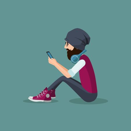 Hipster handsome young man sitting and using mobile smart phone. Isolated long beard man in hat looking to vintage fashion website on cell phone screen through trendy glassesのイラスト素材