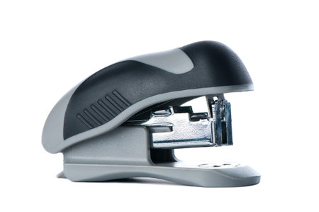 grey professional steapler on white background 