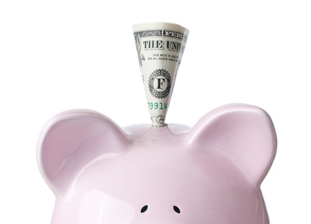 pink piggy bank with dollar on white background, Savingの写真素材