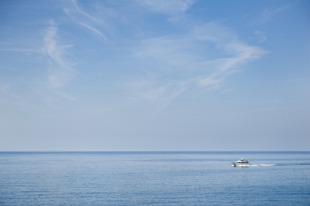 Luxury Yacht. Blue sky over water horizon. boat in the sea.の写真素材