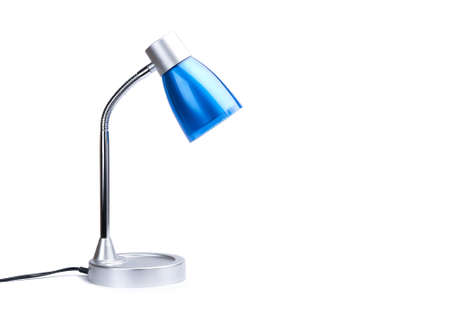 Blue desk lamp on white background.の写真素材