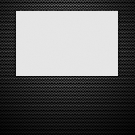  sheet of blank paper isolated on carbon fiber background with copy spaceの写真素材