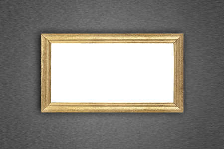 Gold picture frame at the metal wall with clipping pathの写真素材