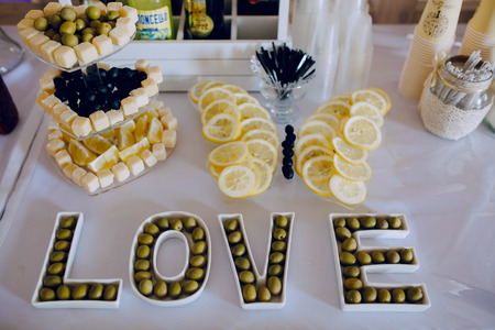 wedding reception decor food white and violletの写真素材