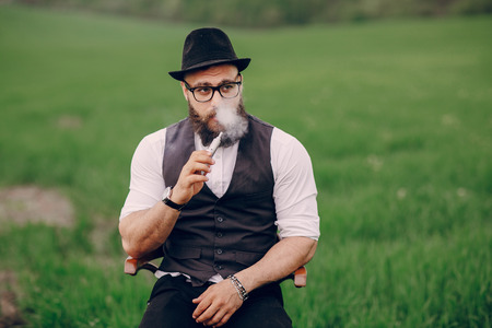 bearded man vapingの写真素材