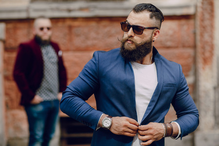 Two bearded men fashion outdoors summer weatherの写真素材